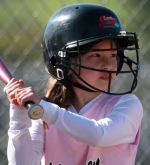 photo: girl batting in almaden valley girls softball league