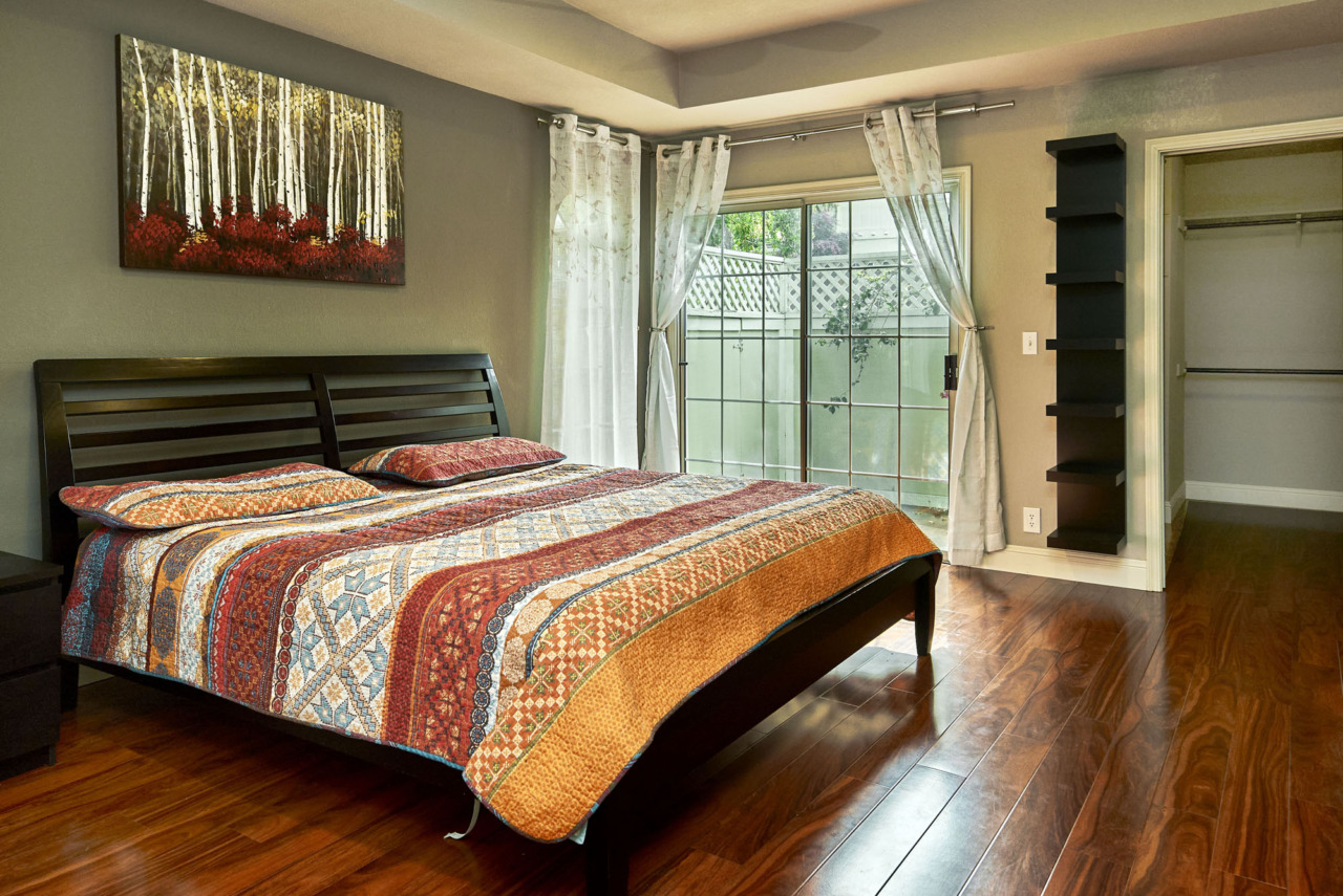 1180 Mountain Quail Circle - Bedroom with Walk-in Closet and Sliding Door to Patio