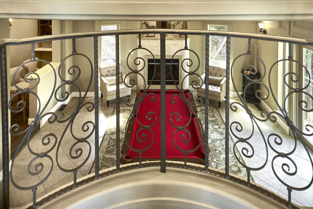 21290 Cinnabar Hills Road, downstairs pool table and fireplace as seen from upstairs