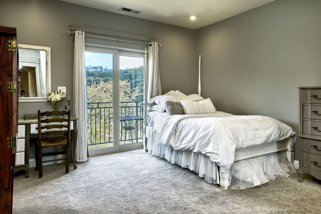 21290 Cinnabar Hills Road, third bedroom with balcony and view