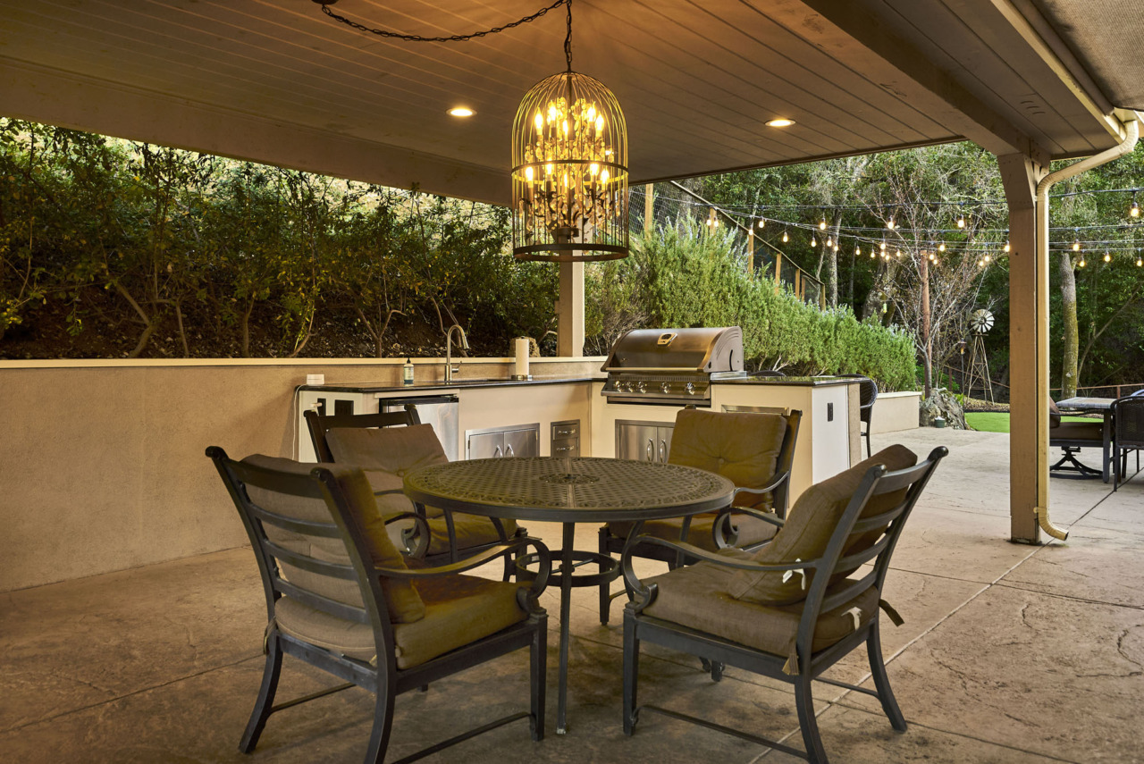 21290 Cinnabar Hills Road, covered outdoor patio with lighting