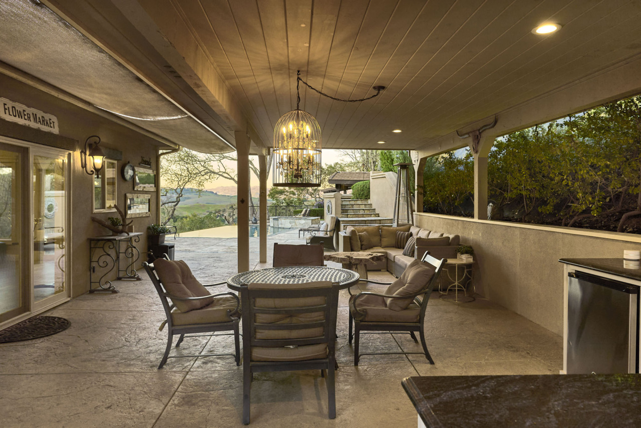 21290 Cinnabar Hills Road, covered patio and view at sunset