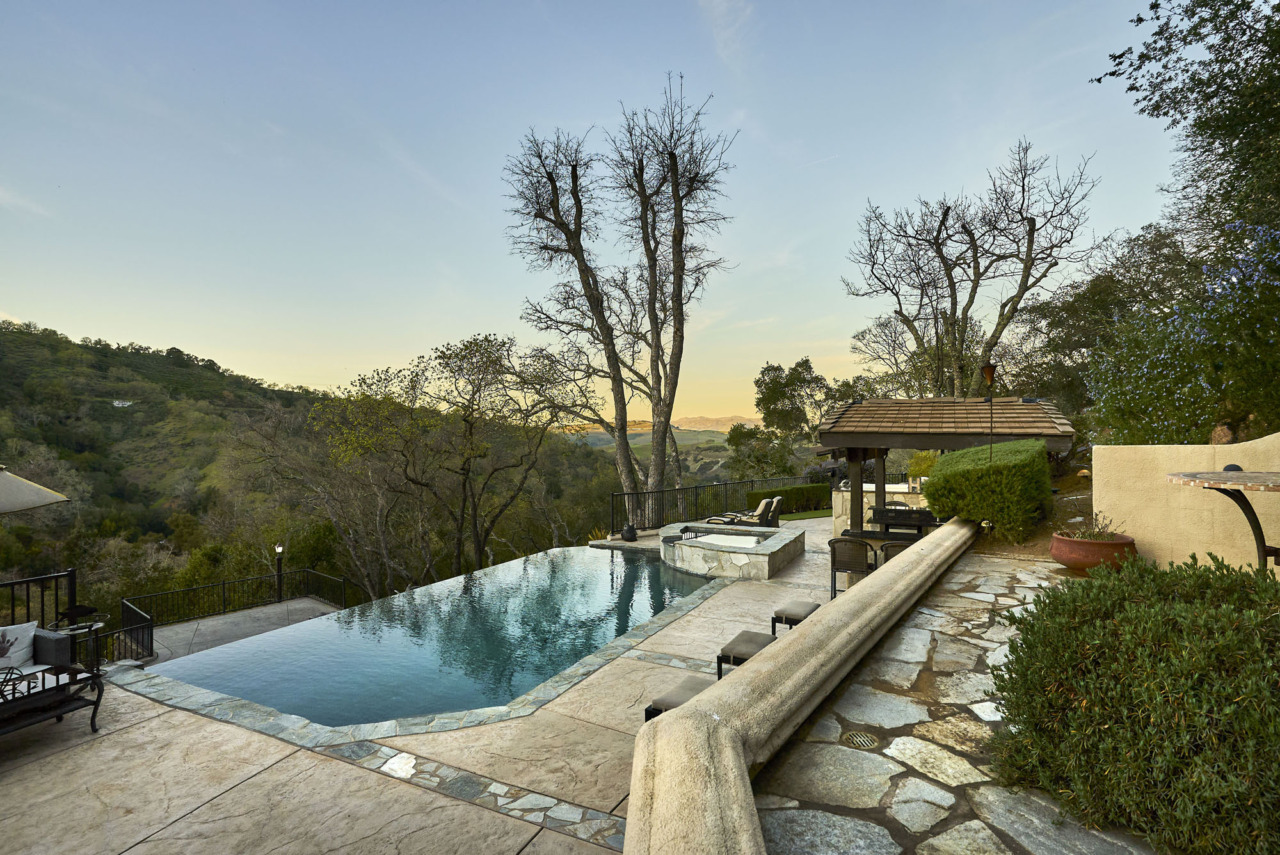 21290 Cinnabar Hills Road, pool and scenic view at sunset