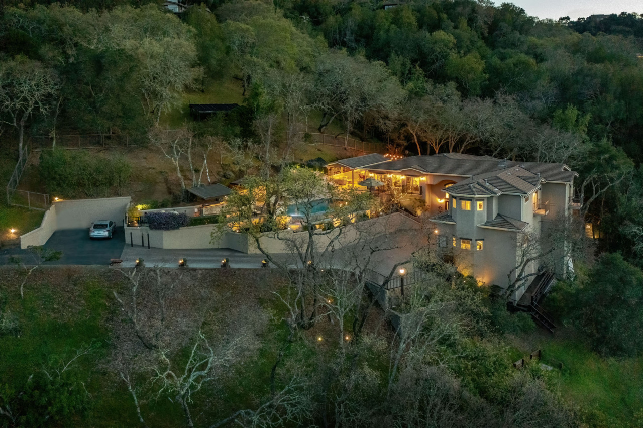 21290 Cinnabar Hills Road, full view of home in evening