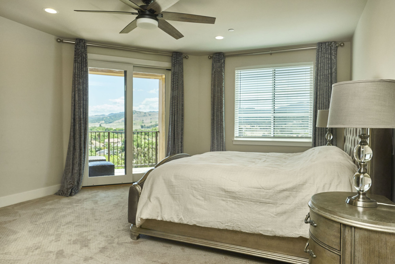 20601 Via Santa Teresa, bedroom with ceiling fan and sliding door to patio and view