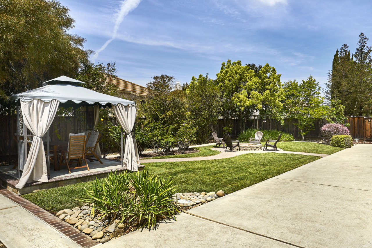 1129 Valley Quail Circle, full view of backyard with gazebo and firepit